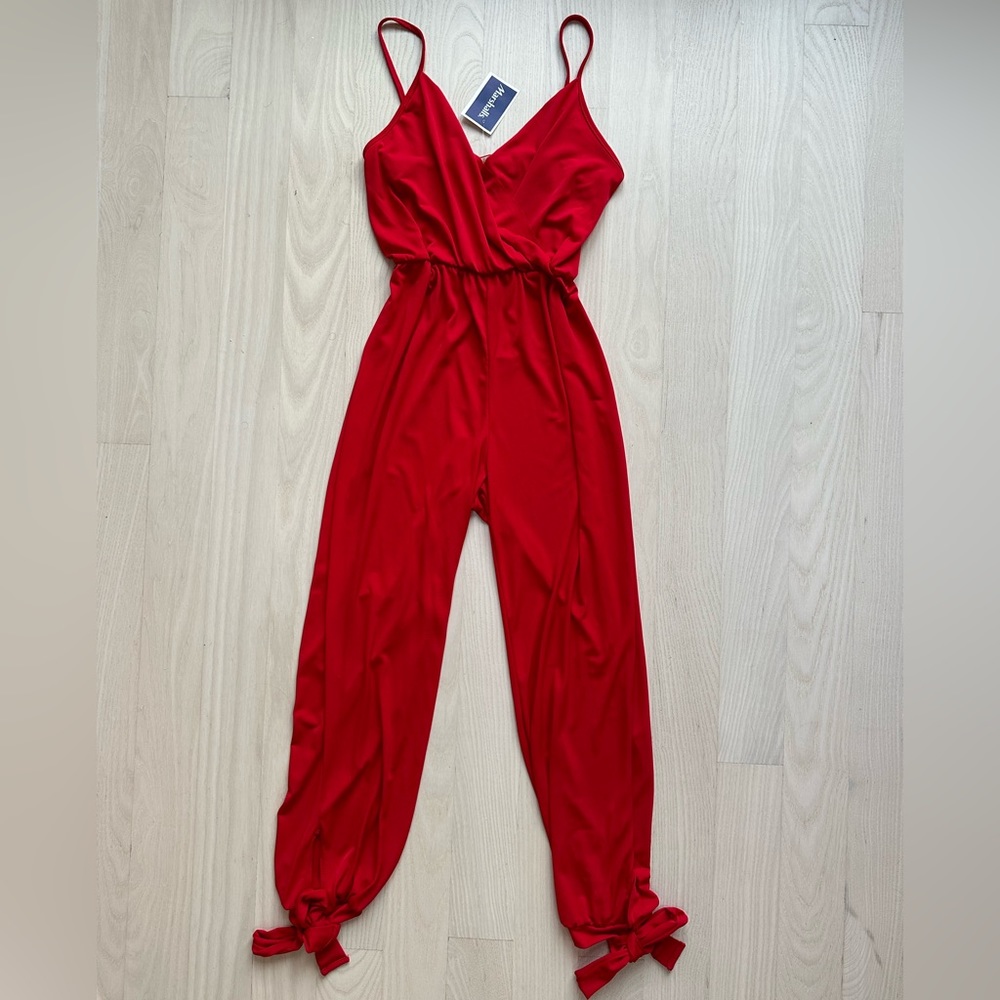 NWT red jumpsuit with bow detail